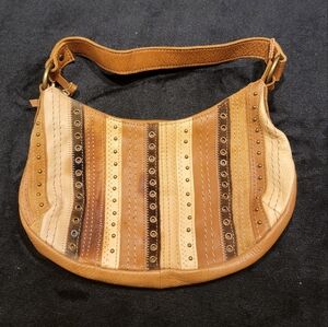 Fossil leather hand bag.